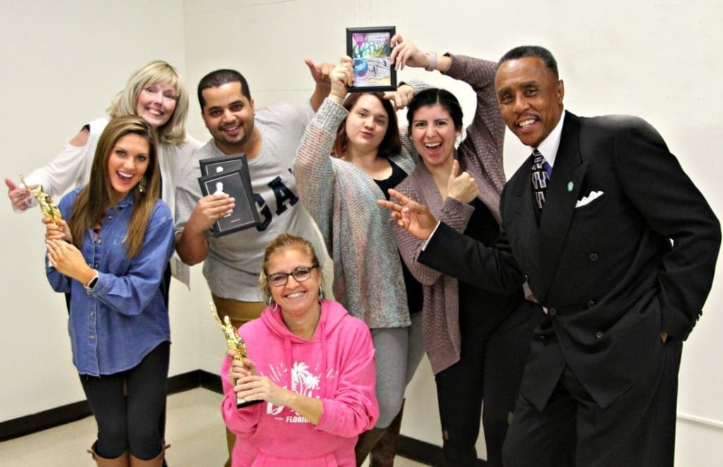 VisCom students and staff pose with awards
