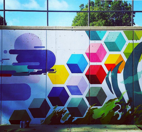 wall panels of graffiti mural surrounding Marian Center